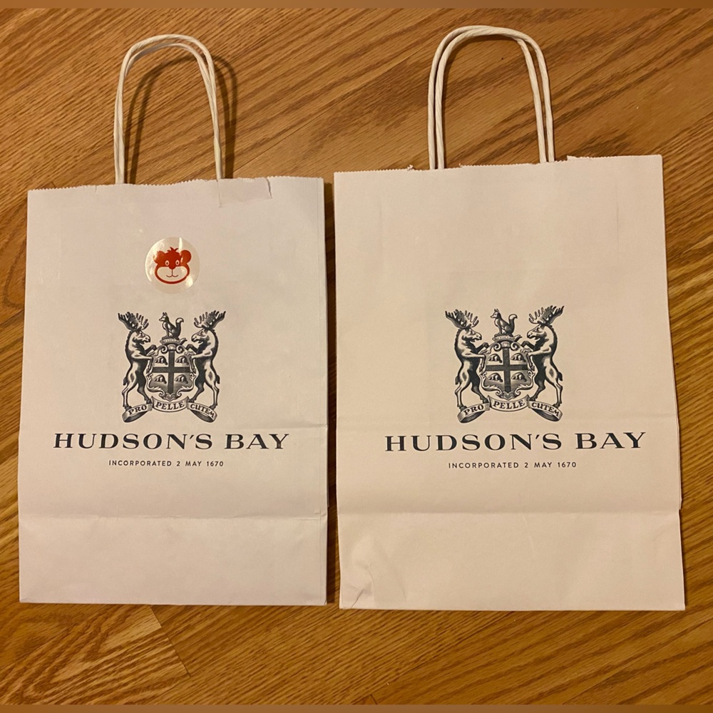 Two (2) white small authentic Hudson’s Bay paper gift bags